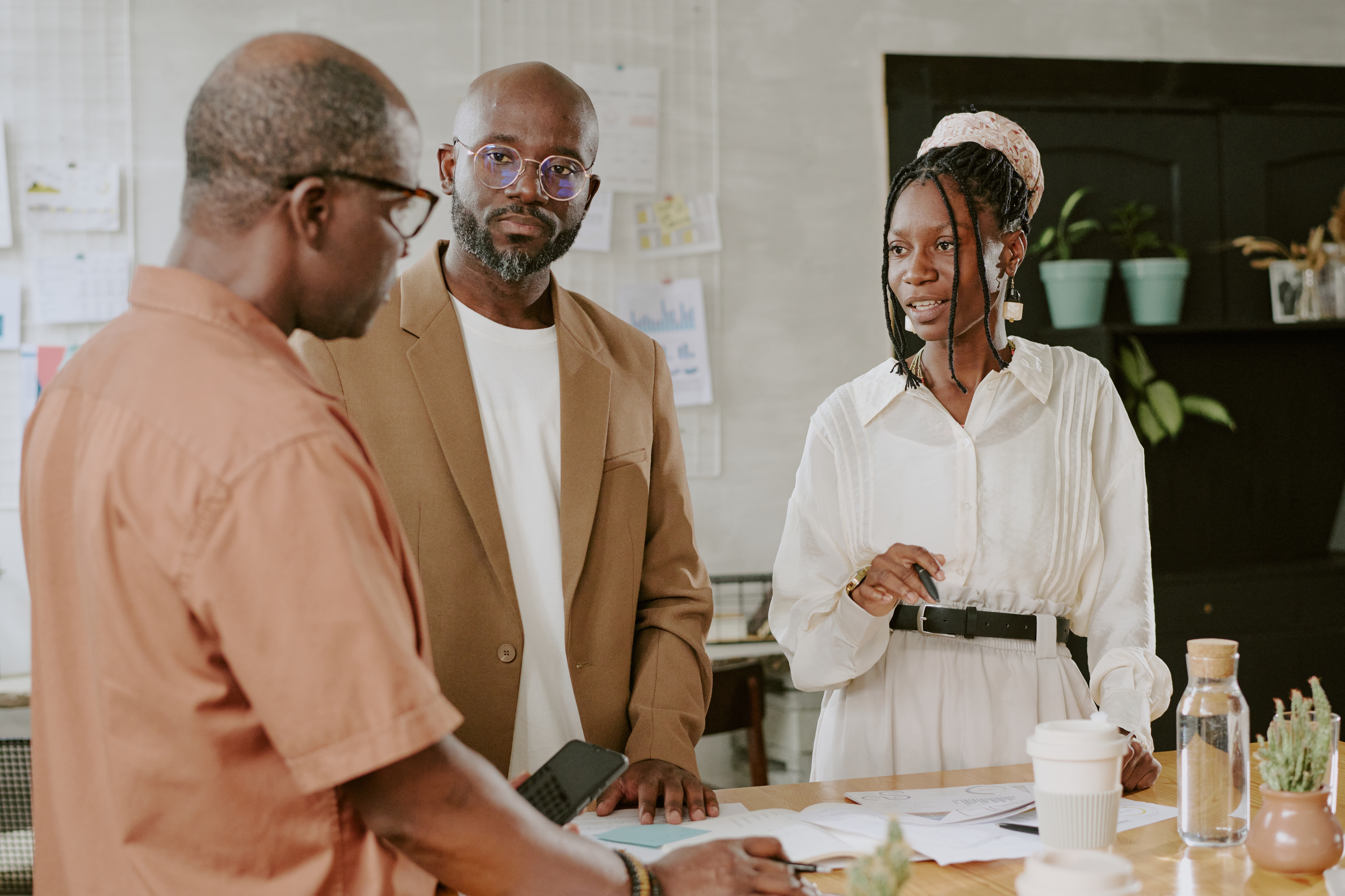African American team discussing new plan in modern office