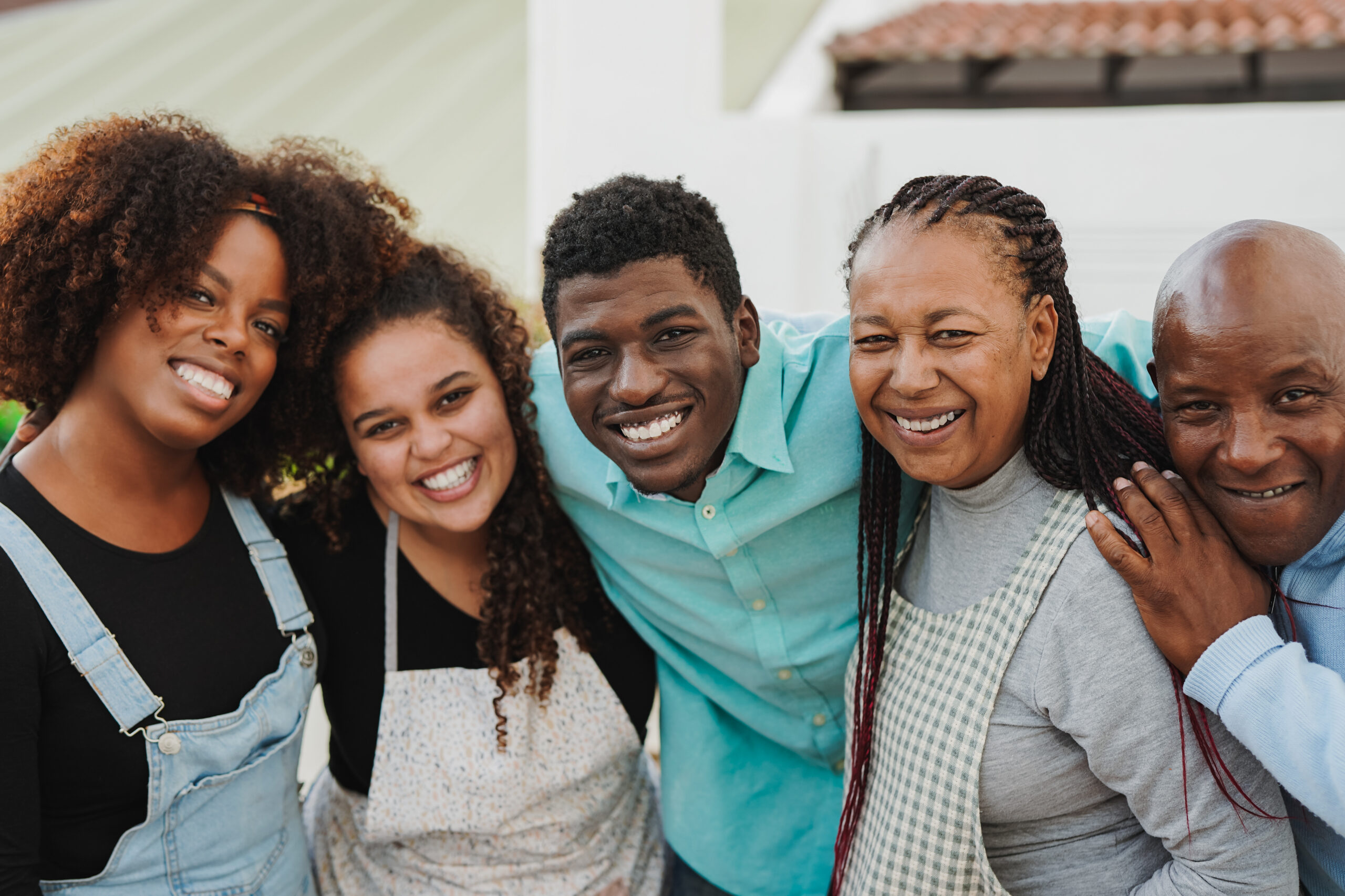 Happy african family smiling on camera
